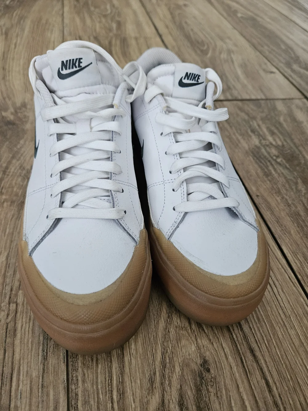 Nike White Leather Sneakers with Gum Sole